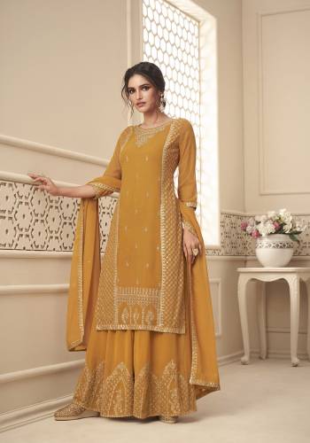 Attrective This Designer Long Length Suit In Lovely Color.Its Pretty Heavy Designer Embroidery,Swarovski Work Top Is Georgette Based Paired With Santoon Bottom And Georgette Fabricated Dupatta Which Gives An Attractive To The Suit.