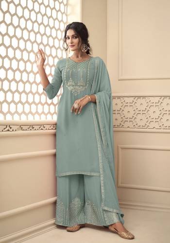 Attrective This Designer Long Length Suit In Lovely Color.Its Pretty Heavy Designer Embroidery,Swarovski Work Top Is Georgette Based Paired With Santoon Bottom And Georgette Fabricated Dupatta Which Gives An Attractive To The Suit.