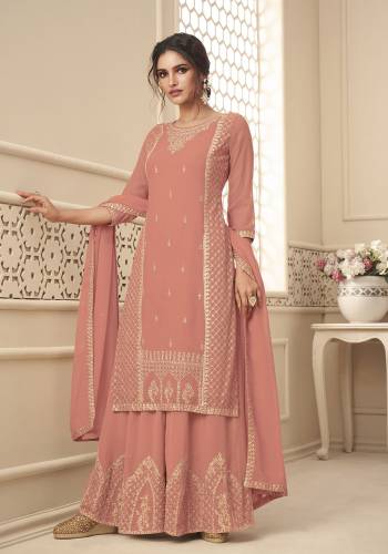 Attrective This Designer Long Length Suit In Lovely Color.Its Pretty Heavy Designer Embroidery,Swarovski Work Top Is Georgette Based Paired With Santoon Bottom And Georgette Fabricated Dupatta Which Gives An Attractive To The Suit.