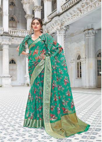 Looking This Traditional Saree Are Fine Saree Paired With Blouse.This Saree And Blouse Are Organza Based Fabric With Wevon Border Pallu With Digital Printed. Buy This Pretty Saree Now.