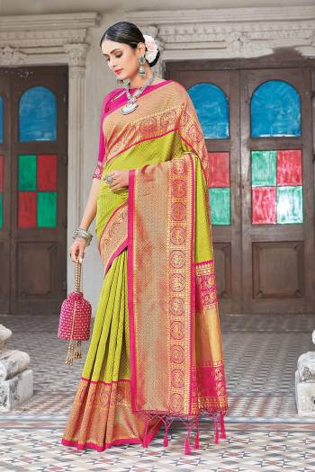 Garb This Designer Partywear Saree Are Fine Saree Paired With Contrasted Blouse.This Saree And Blouse Are Silk Based Fabric With Wevon Designer Work. Buy This Pretty Saree Now.