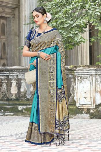 Garb This Designer Partywear Saree Are Fine Saree Paired With Contrasted Blouse.This Saree And Blouse Are Silk Based Fabric With Wevon Designer Work. Buy This Pretty Saree Now.