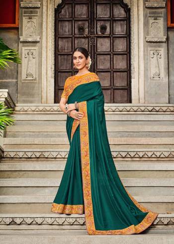 Garb This Traditional Saree Are Fine Saree Paired With Blouse.This Saree And Blouse Are Art Silk Based Fabric With Heavy Designer Embroidery Work. Buy This Pretty Saree Now.