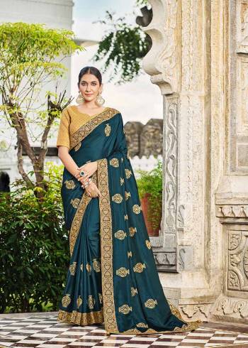 Garb This Traditional Saree Are Fine Saree Paired With Blouse.This Saree And Blouse Are Art Silk Based Fabric With Heavy Designer Embroidery Work. Buy This Pretty Saree Now.