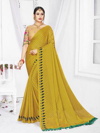 Looking This Designer Partywear Saree Are Fine Saree Paired With Contrasted Blouse.This Saree Are Moss Chiffon Printed And Blouse Are Net Based Fabric With Designer Embroidery Work. Buy This Pretty Saree Now.