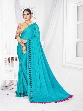 Looking This Designer Partywear Saree Are Fine Saree Paired With Contrasted Blouse.This Saree Are Moss Chiffon Printed And Blouse Are Net Based Fabric With Designer Embroidery Work. Buy This Pretty Saree Now.