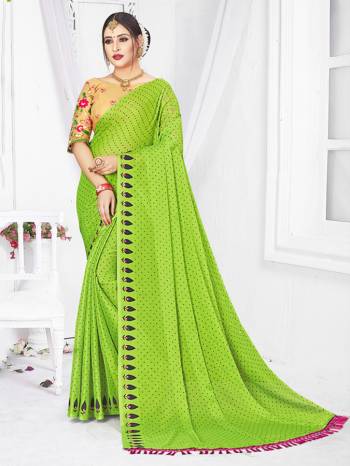 Looking This Designer Partywear Saree Are Fine Saree Paired With Contrasted Blouse.This Saree Are Moss Chiffon Printed And Blouse Are Net Based Fabric With Designer Embroidery Work. Buy This Pretty Saree Now.