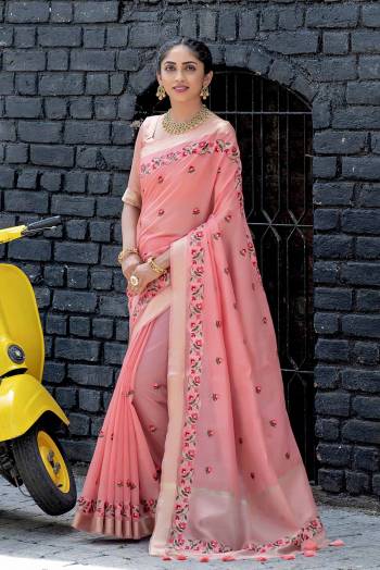 Garb This Designer Partywear Saree Are Fine Saree Paired With Blouse.This Saree And Blouse Are Linen Based Fabric With Wevon Designer Palu Border With Embroidery Work. Buy This Pretty Saree Now.