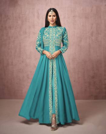 Attrective This Designer Long Length Free Size Stitched Suit In Lovely Color.Its Pretty Heavy Designer Thread Embroidery Work Top Is Georgette Based Paired With Santoon Bottom And Georgette Fabricated Dupatta Which Gives An Attractive To The Suit.