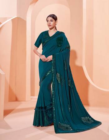 Garb This Partywear Stylist Designer Fine Colour Saree Paired With Blouse.This Saree Are Lycra And Blouse Are Raw Silk Fabric With Heavy Designer Embroidery Work. Buy This Pretty Saree Now.