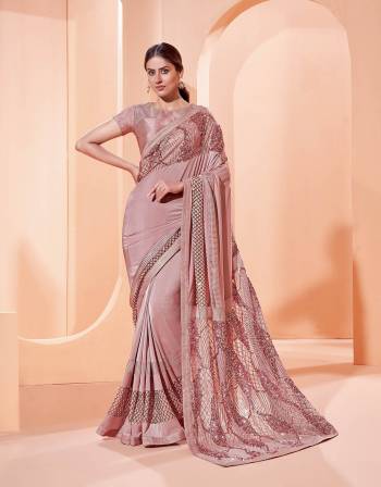 Garb This Partywear Stylist Designer Fine Colour Saree Paired With Blouse.This Saree Are Lycra And Blouse Are Raw Silk Fabric With Heavy Designer Embroidery Work. Buy This Pretty Saree Now.