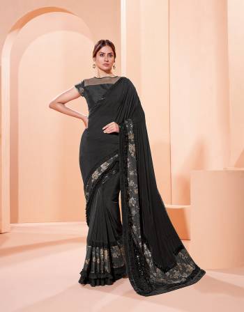 Garb This Partywear Stylist Designer Fine Colour Saree Paired With Blouse.This Saree Are Lycra And Blouse Are Raw Silk Fabric With Heavy Designer Embroidery Work. Buy This Pretty Saree Now.