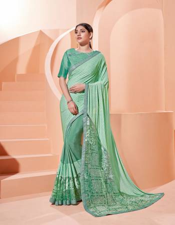 Garb This Partywear Stylist Designer Fine Colour Saree Paired With Blouse.This Saree Are Lycra And Blouse Are Raw Silk Fabric With Heavy Designer Embroidery Work. Buy This Pretty Saree Now.