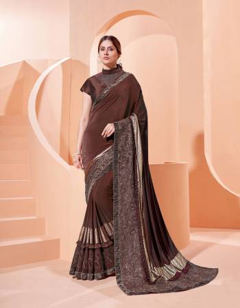 Garb This Partywear Stylist Designer Fine Colour Saree Paired With Blouse.This Saree Are Lycra And Blouse Are Raw Silk Fabric With Heavy Designer Embroidery Work. Buy This Pretty Saree Now.