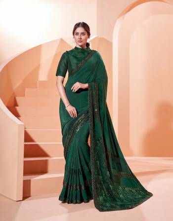 Garb This Partywear Stylist Designer Fine Colour Saree Paired With Blouse.This Saree Are Lycra And Blouse Are Raw Silk Fabric With Heavy Designer Embroidery Work. Buy This Pretty Saree Now.