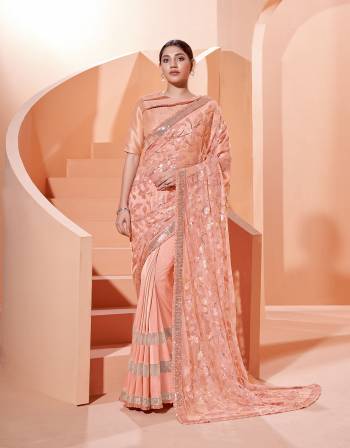 Garb This Partywear Stylist Designer Fine Colour Saree Paired With Blouse.This Saree Are Lycra And Blouse Are Raw Silk Fabric With Heavy Designer Embroidery Work. Buy This Pretty Saree Now.