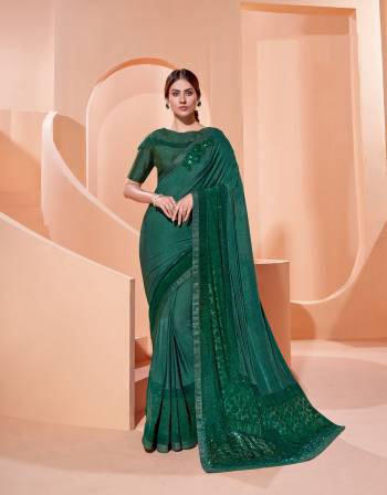 Garb This Partywear Stylist Designer Fine Colour Saree Paired With Blouse.This Saree Are Lycra And Blouse Are Raw Silk Fabric With Heavy Designer Embroidery Work. Buy This Pretty Saree Now.