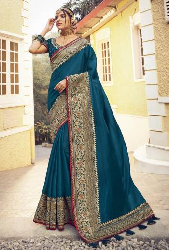 Looking This Designer Partywear Saree Are Fine Saree Paired With Blouse.This Saree Are Shimmer Silk And Blouse Pashmina Dupion Based Fabric With Heavy Designer Embroidery Work. Buy This Pretty Saree Now.