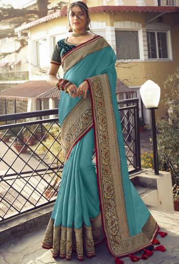 Looking This Designer Partywear Saree Are Fine Saree Paired With Blouse.This Saree Are Shimmer Silk And Blouse Pashmina Dupion Based Fabric With Heavy Designer Embroidery Work. Buy This Pretty Saree Now.