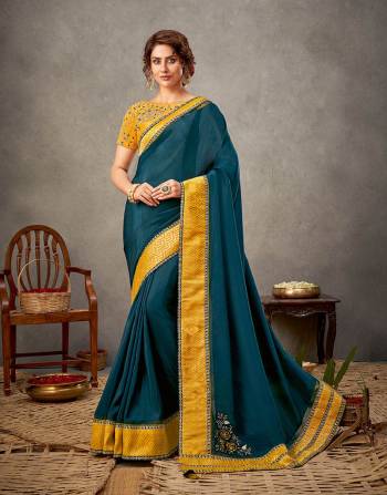 Garb This Partywear Stylist Designer Fine Colour Saree Paired With Blouse.This Saree Are Silk Georgette And Blouse Are Raw Silk Fabric With Heavy Designer Embroidery Work. Buy This Pretty Saree Now.