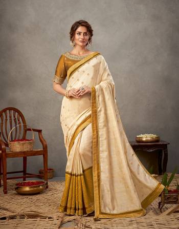 Garb This Partywear Stylist Designer Fine Colour Saree Paired With Blouse.This Saree Are Tussar Silk And Blouse Are Raw Silk Fabric With Heavy Designer Embroidery Work. Buy This Pretty Saree Now.