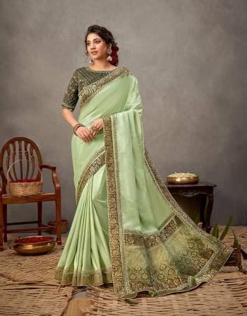 Garb This Partywear Stylist Designer Fine Colour Saree Paired With Blouse.This Saree Are Tussar Silk And Blouse Are Raw Silk Fabric With Heavy Designer Embroidery Work. Buy This Pretty Saree Now.