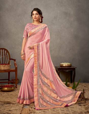 Garb This Partywear Stylist Designer Fine Colour Saree Paired With Blouse.This Saree Are Satin Silk And Blouse Are Raw Silk Fabric With Heavy Designer Embroidery Work. Buy This Pretty Saree Now.