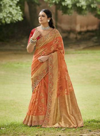 Looking This Stylist Partywear Saree Are Fine Saree Paired With Blouse.This Saree And Blouse Are Organza Tissue Fabric With Heavy Designer Weaving With Embroidery Border,Blouse Work. Buy This Pretty Saree Now.