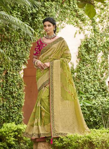 Looking This Stylist Partywear Saree Are Fine Saree Paired With Blouse.This Saree And Blouse Are Organza Tissue Fabric With Heavy Designer Weaving With Embroidery Border,Blouse Work. Buy This Pretty Saree Now.