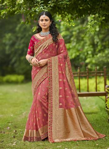 Looking This Stylist Partywear Saree Are Fine Saree Paired With Blouse.This Saree And Blouse Are Organza Tissue Fabric With Heavy Designer Weaving With Embroidery Border,Blouse Work. Buy This Pretty Saree Now.