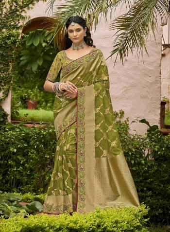 Looking This Stylist Partywear Saree Are Fine Saree Paired With Blouse.This Saree And Blouse Are Organza Tissue Fabric With Heavy Designer Weaving With Embroidery Border,Blouse Work. Buy This Pretty Saree Now.