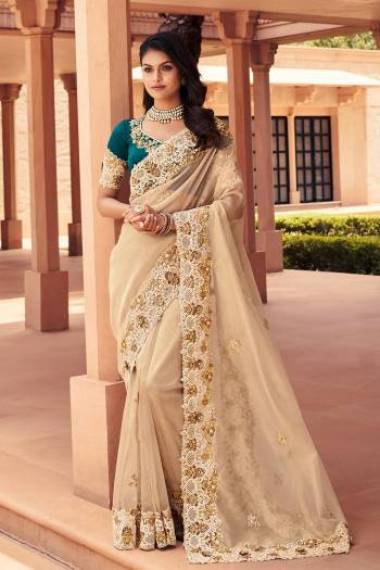 Attrective This Designer Partywear Saree Are Fine Saree Paired With Blouse.This Saree Are Organza Zari And Blouse Rose Silk Based Fabric With Heavy Designer Embroidery Work. Buy This Pretty Saree Now.