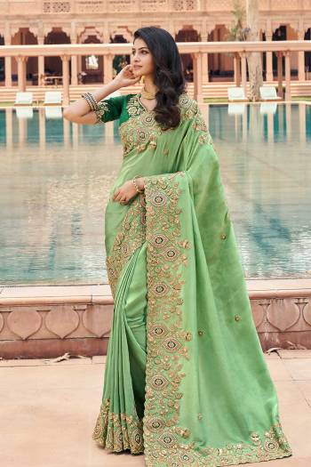 Attrective This Designer Partywear Saree Are Fine Saree Paired With Blouse.This Saree Are Viscose And Blouse Rose Silk Based Fabric With Heavy Designer Embroidery Work. Buy This Pretty Saree Now.