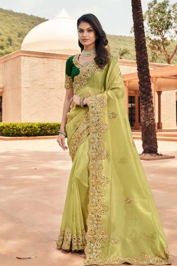 Attrective This Designer Partywear Saree Are Fine Saree Paired With Blouse.This Saree Are Zari Silk And Blouse Rose Silk Based Fabric With Heavy Designer Embroidery Work. Buy This Pretty Saree Now.