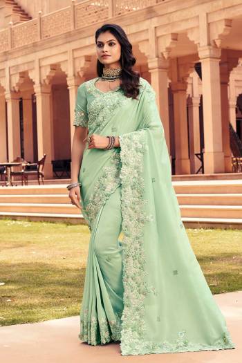 Attrective This Designer Partywear Saree Are Fine Saree Paired With Blouse.This Saree Are Art Silk And Blouse Rose Silk Based Fabric With Heavy Designer Embroidery Work. Buy This Pretty Saree Now.