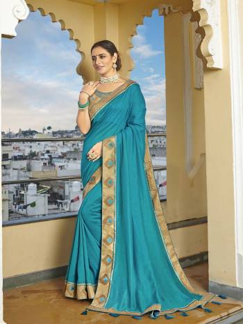 Looking This Designer Partywear Saree Are Fine Saree Paired With Blouse.This Saree Are Vichitra Silk And Blouse Phantom Silk Based Fabric With Heavy Designer Embroidery,Swarovski Work Work. Buy This Pretty Saree Now.