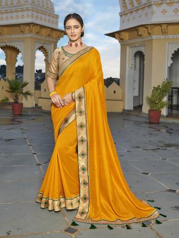 Looking This Designer Partywear Saree Are Fine Saree Paired With Blouse.This Saree Are Vichitra Silk And Blouse Phantom Silk Based Fabric With Heavy Designer Embroidery,Swarovski Work Work. Buy This Pretty Saree Now.