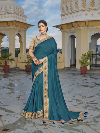 Looking This Designer Partywear Saree Are Fine Saree Paired With Blouse.This Saree Are Vichitra Silk And Blouse Phantom Silk Based Fabric With Heavy Designer Embroidery,Swarovski Work Work. Buy This Pretty Saree Now.