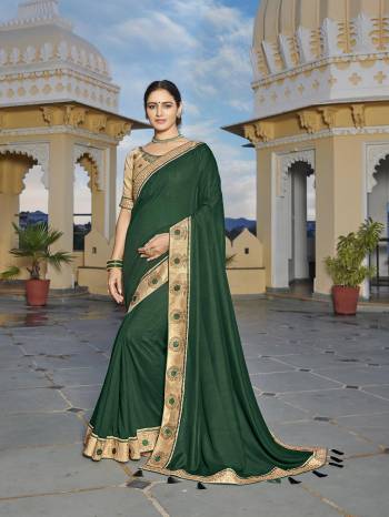 Looking This Designer Partywear Saree Are Fine Saree Paired With Blouse.This Saree Are Vichitra Silk And Blouse Phantom Silk Based Fabric With Heavy Designer Embroidery,Swarovski Work Work. Buy This Pretty Saree Now.