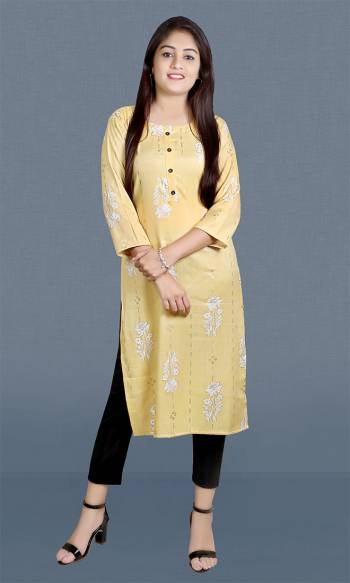 Garb This Readymade Long Kurti In Fine Color Fabricated On Rayon Slub Beautified With Foil Printed Designer. It Is Light In Weight And Easy To Carry All Day Long. 