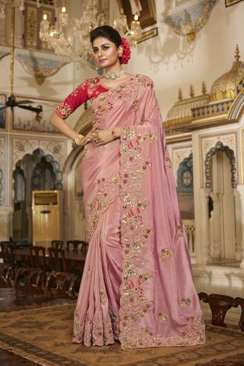 Garb This Stylist Partywear Saree Are Fine Saree Paired With Blouse.This Saree Are Viscose With Golden Smoke And Blouse Are Raw Silk Fabric With Heavy Designer Embroidery Work With Beads. Buy This Pretty Saree Now.