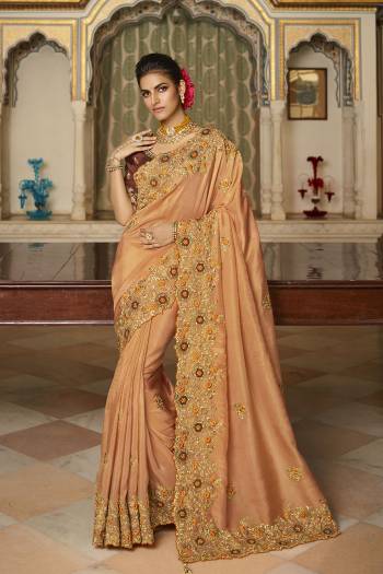 Garb This Stylist Partywear Saree Are Fine Saree Paired With Blouse.This Saree Are Viscose With Golden Smoke And Blouse Are Raw Silk Fabric With Heavy Designer Embroidery Work With Beads. Buy This Pretty Saree Now.