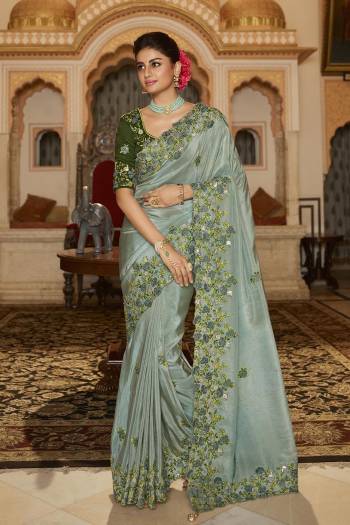 Garb This Stylist Partywear Saree Are Fine Saree Paired With Blouse.This Saree Are Viscose With Golden Smoke And Blouse Are Raw Silk Fabric With Heavy Designer Embroidery Work With Beads. Buy This Pretty Saree Now.