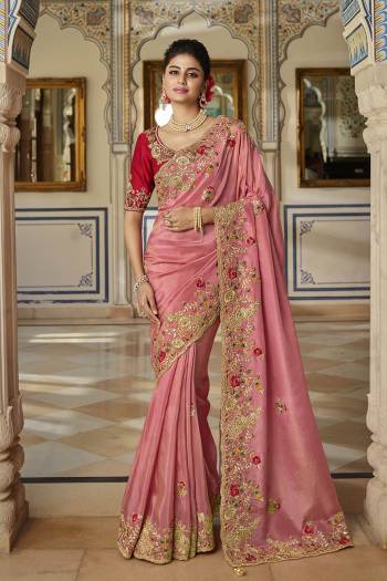 Garb This Stylist Partywear Saree Are Fine Saree Paired With Blouse.This Saree Are Viscose With Golden Smoke And Blouse Are Raw Silk Fabric With Heavy Designer Embroidery Work With Beads. Buy This Pretty Saree Now.