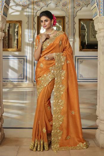 Garb This Stylist Partywear Saree Are Fine Saree Paired With Blouse.This Saree Are Viscose With Golden Smoke And Blouse Are Raw Silk Fabric With Heavy Designer Embroidery Work With Beads. Buy This Pretty Saree Now.