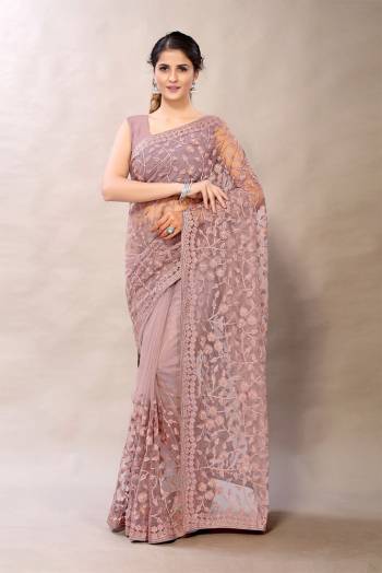 Looking This Partywear Saree Are Fine Saree Paired With Blouse.This Saree And Blouse Are Net Fabric With Heavy Designer Embroidery With Stone Work. Buy This Pretty Saree Now.