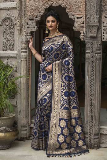 Garb This Traditional Saree Are Fine Saree Paired With Blouse.This Saree And Blouse Are Banarasi Silk Fabric With Heavy Designer Weaving Jacquard Work. Buy This Pretty Saree Now.