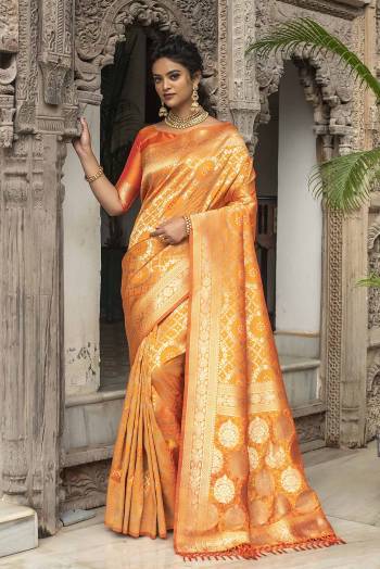 Garb This Traditional Saree Are Fine Saree Paired With Blouse.This Saree And Blouse Are Banarasi Silk Fabric With Heavy Designer Weaving Jacquard Work. Buy This Pretty Saree Now.