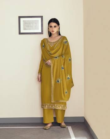 Looking This Designer Collection In Long Length Suits Fine Color.Its Pretty Designer Embroidery Work Top Is Georgette Based Paired With Santoon Bottom And Georgette Fabricated Dupatta Which Gives An Attractive To The Suit.