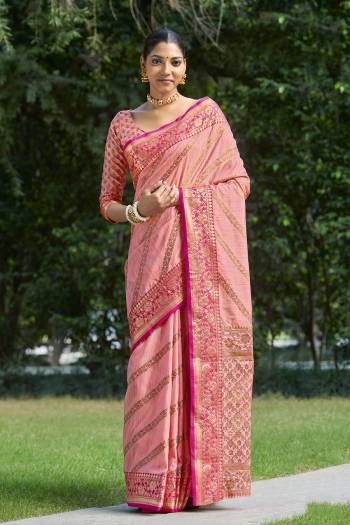 Garb This Designer Partywear Saree Are Fine Saree Paired With Blouse.This Saree And Blouse Are Silk Based Fabric With Wevon Designer Work. Buy This Pretty Saree Now.